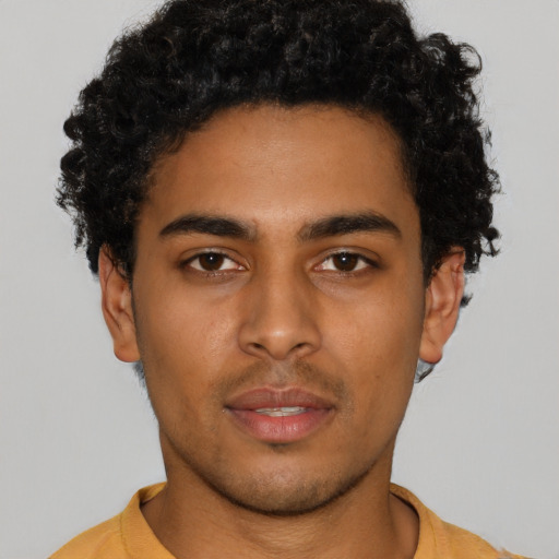 Neutral latino young-adult male with short  brown hair and brown eyes