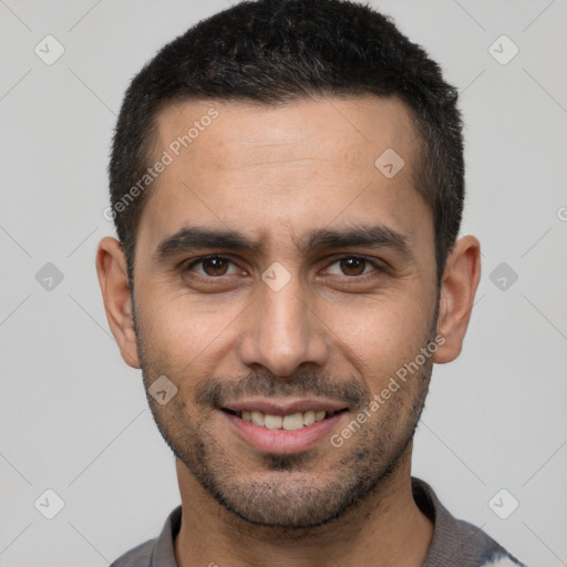 Joyful white young-adult male with short  black hair and brown eyes