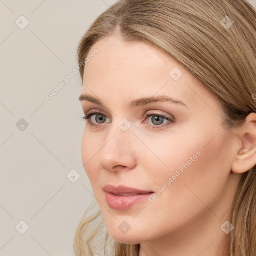 Neutral white young-adult female with long  brown hair and brown eyes