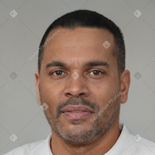 Neutral latino adult male with short  black hair and brown eyes