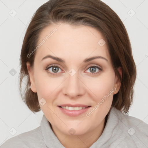 Joyful white young-adult female with medium  brown hair and blue eyes