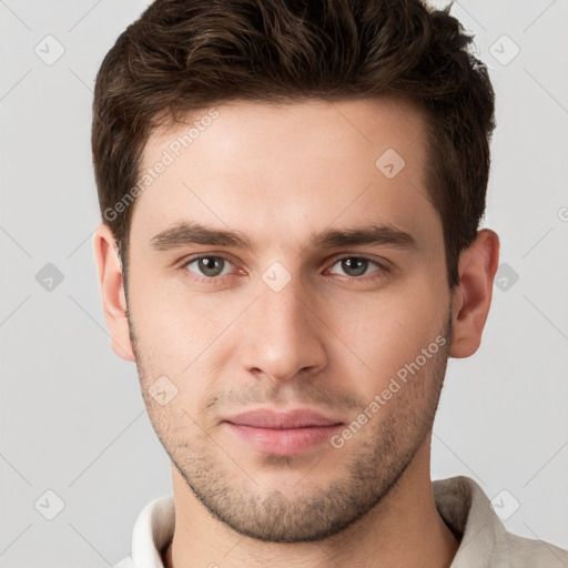 Neutral white young-adult male with short  brown hair and brown eyes