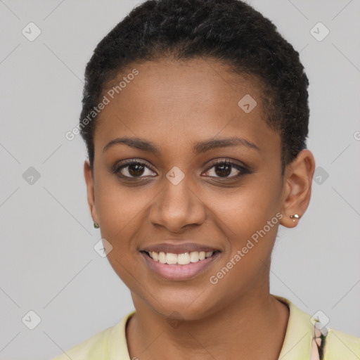 Joyful black young-adult female with short  brown hair and brown eyes