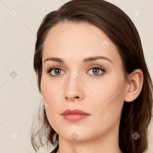 Neutral white young-adult female with long  brown hair and brown eyes