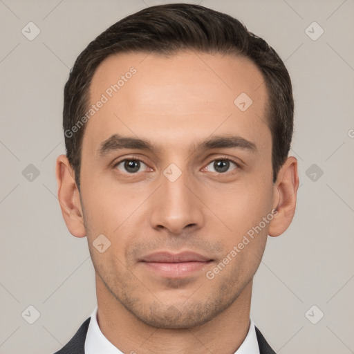 Joyful white young-adult male with short  brown hair and brown eyes