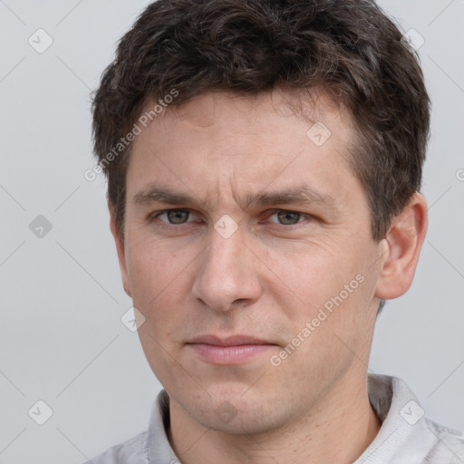 Neutral white adult male with short  brown hair and brown eyes