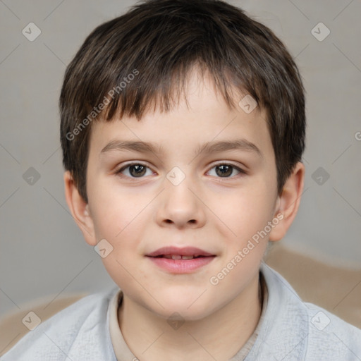 Joyful white child male with short  brown hair and brown eyes