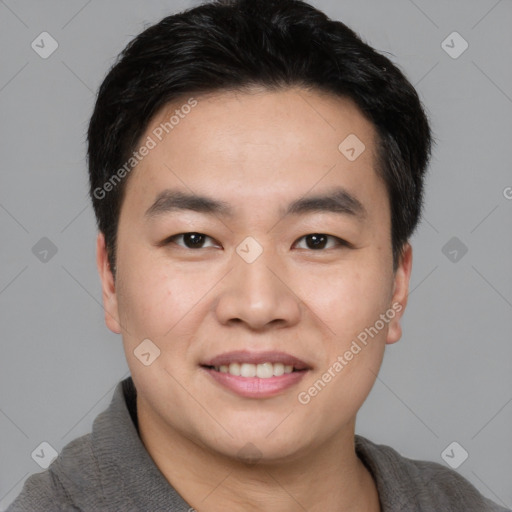 Joyful white young-adult male with short  black hair and brown eyes