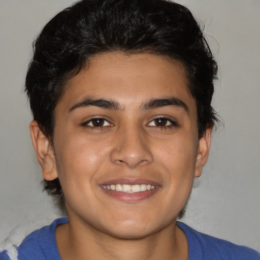 Joyful white young-adult male with medium  brown hair and brown eyes