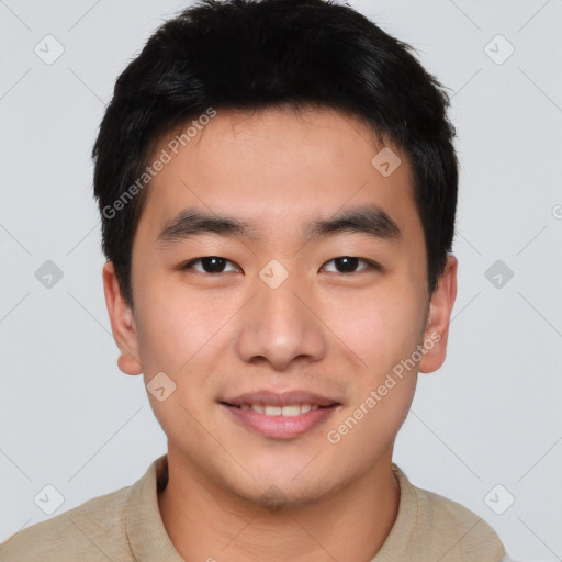 Joyful white young-adult male with short  black hair and brown eyes