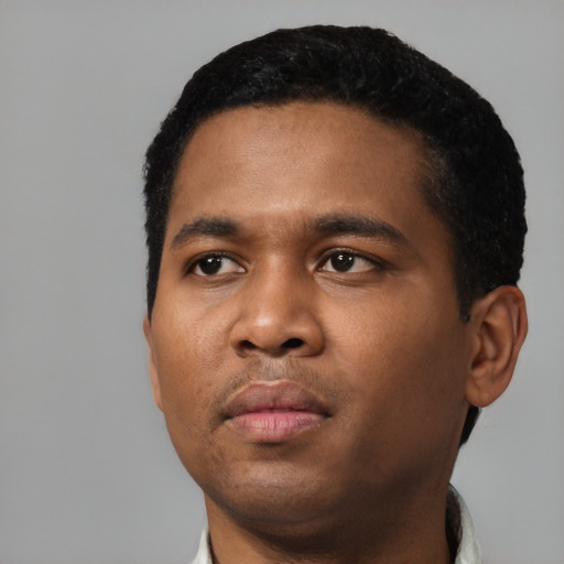 Neutral black young-adult male with short  black hair and brown eyes