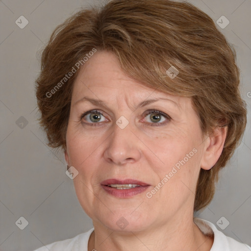 Joyful white adult female with medium  brown hair and blue eyes