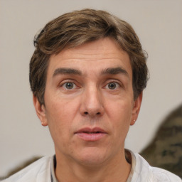 Neutral white adult male with short  brown hair and brown eyes