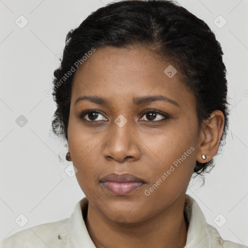 Neutral black young-adult female with short  brown hair and brown eyes