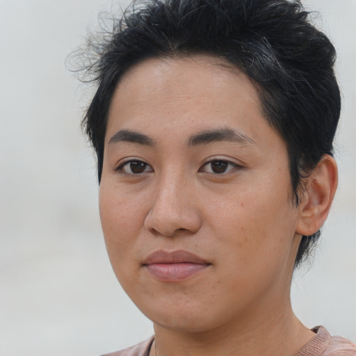 Joyful asian young-adult female with short  brown hair and brown eyes