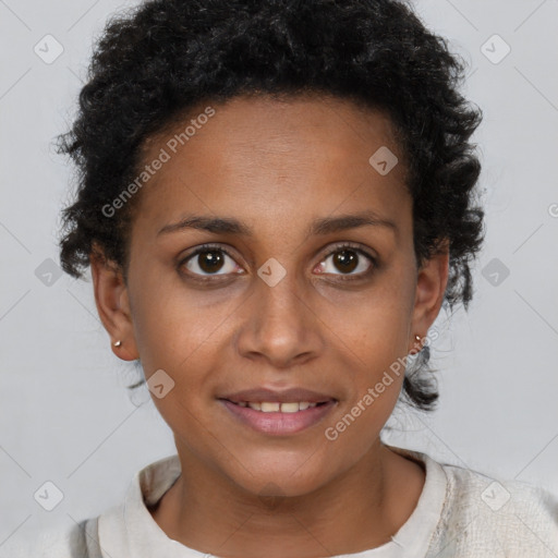 Joyful black young-adult female with short  brown hair and brown eyes