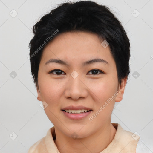 Joyful asian young-adult female with short  black hair and brown eyes