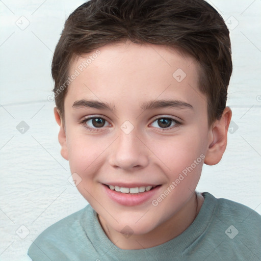 Joyful white child male with short  brown hair and brown eyes