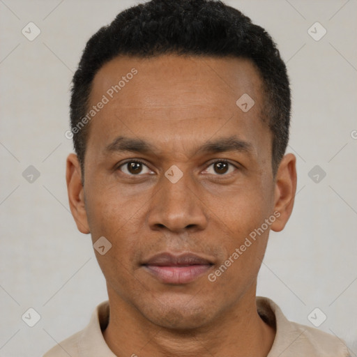 Joyful latino adult male with short  black hair and brown eyes