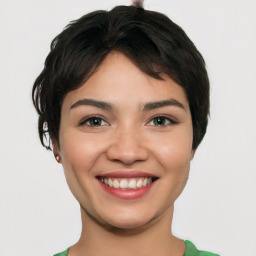 Joyful white young-adult female with short  black hair and brown eyes