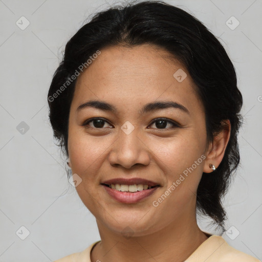 Joyful latino young-adult female with medium  black hair and brown eyes