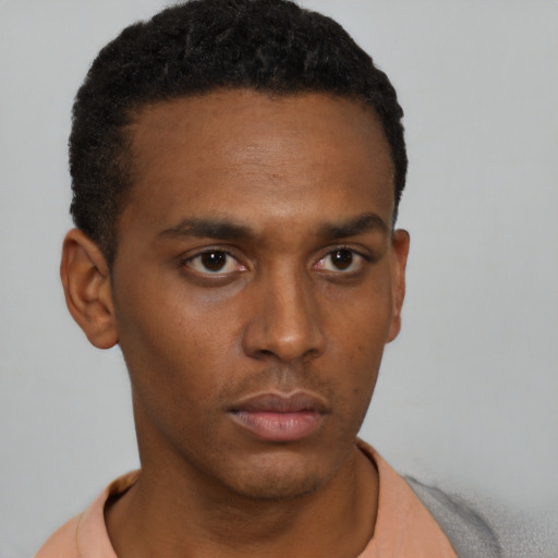 Neutral black young-adult male with short  black hair and brown eyes