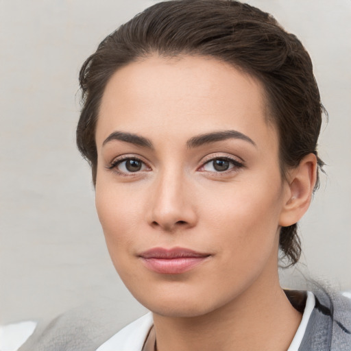 Neutral white young-adult female with medium  brown hair and brown eyes