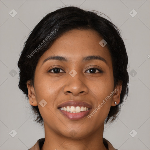 Joyful latino young-adult female with medium  brown hair and brown eyes