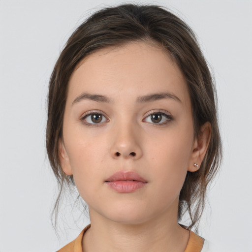 Neutral white young-adult female with medium  brown hair and brown eyes