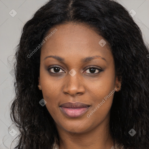 Joyful black young-adult female with long  brown hair and brown eyes