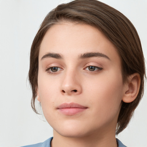 Neutral white young-adult female with medium  brown hair and brown eyes