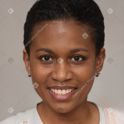 Joyful black young-adult female with short  brown hair and brown eyes