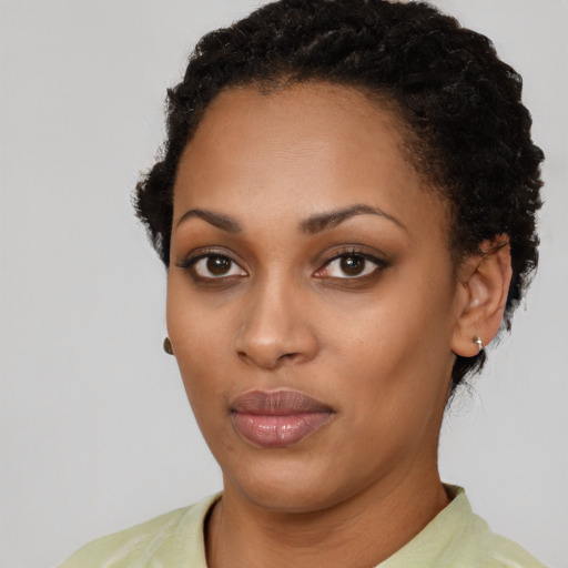 Neutral black young-adult female with short  black hair and brown eyes