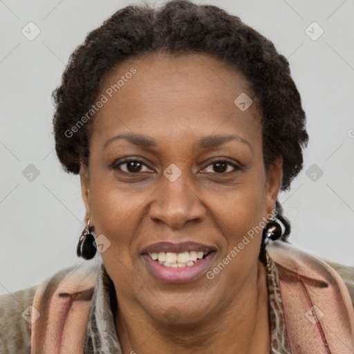 Joyful black adult female with short  brown hair and brown eyes