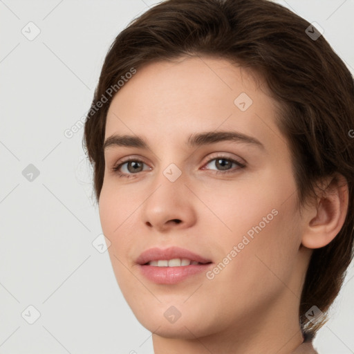 Neutral white young-adult female with short  brown hair and brown eyes