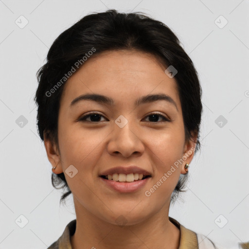 Joyful latino young-adult female with medium  brown hair and brown eyes