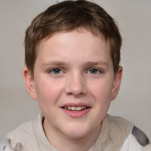 Joyful white child male with medium  brown hair and blue eyes