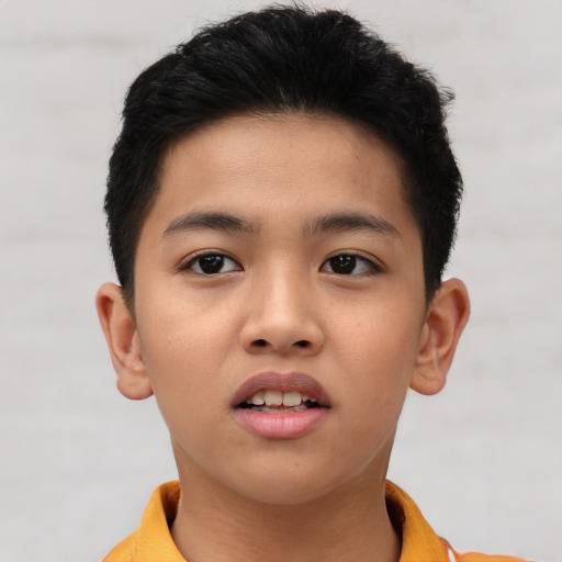 Neutral asian child male with short  brown hair and brown eyes