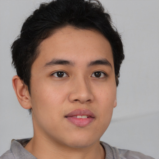 Neutral asian young-adult male with short  brown hair and brown eyes