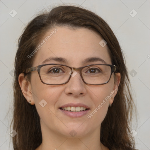 Joyful white adult female with medium  brown hair and brown eyes