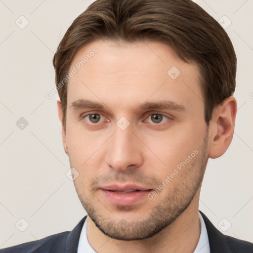 Neutral white young-adult male with short  brown hair and grey eyes