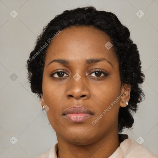 Neutral black young-adult female with short  black hair and brown eyes