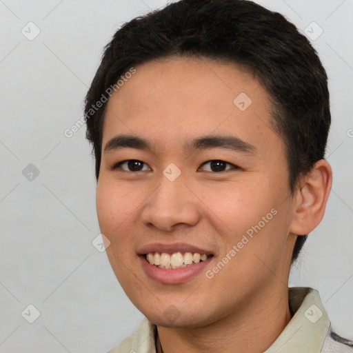 Joyful white young-adult male with short  black hair and brown eyes