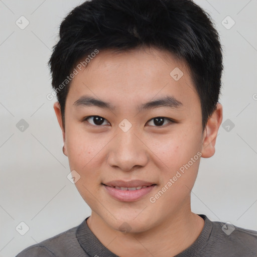 Joyful asian young-adult male with short  black hair and brown eyes