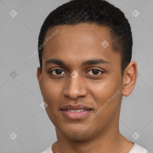 Joyful black young-adult male with short  brown hair and brown eyes