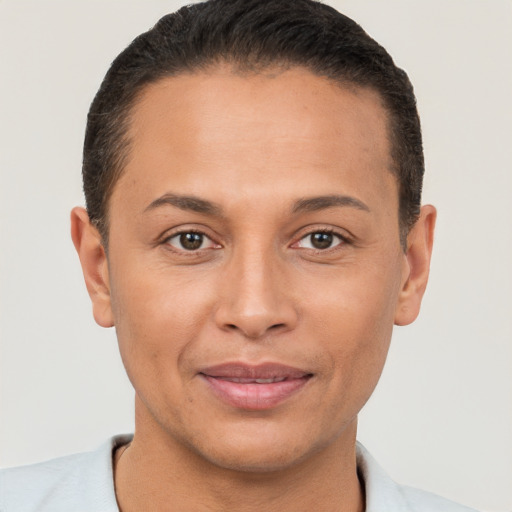 Joyful white adult female with short  brown hair and brown eyes