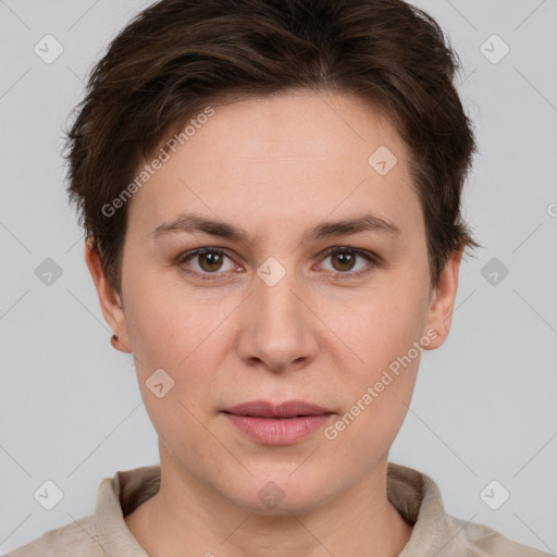 Joyful white young-adult female with short  brown hair and grey eyes