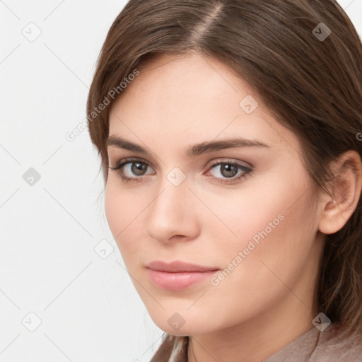 Neutral white young-adult female with long  brown hair and brown eyes