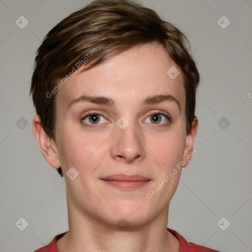 Joyful white young-adult female with short  brown hair and grey eyes