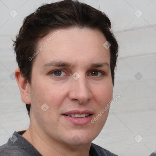 Joyful white adult female with short  brown hair and grey eyes